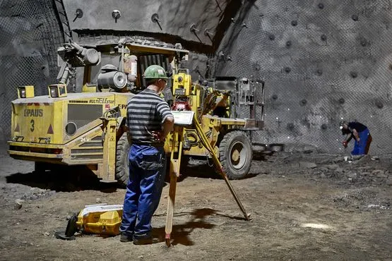 An employee at the Konrad mine carries out geological measurements