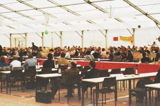 People sitting in the audience at an event