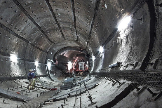 Two miners carry out measuring work in the Konrad mine